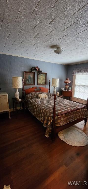 bedroom featuring hardwood / wood-style flooring