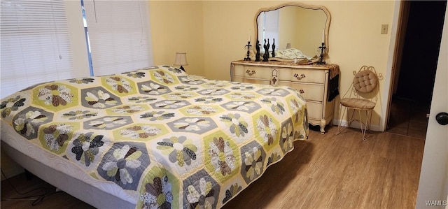 bedroom featuring light wood-type flooring