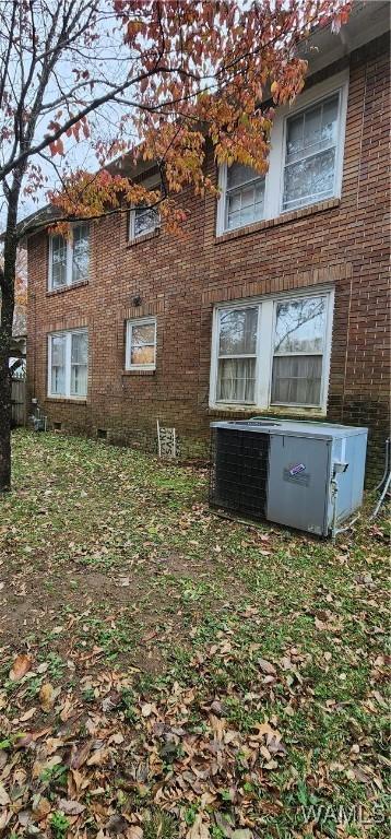 view of home's exterior with central air condition unit