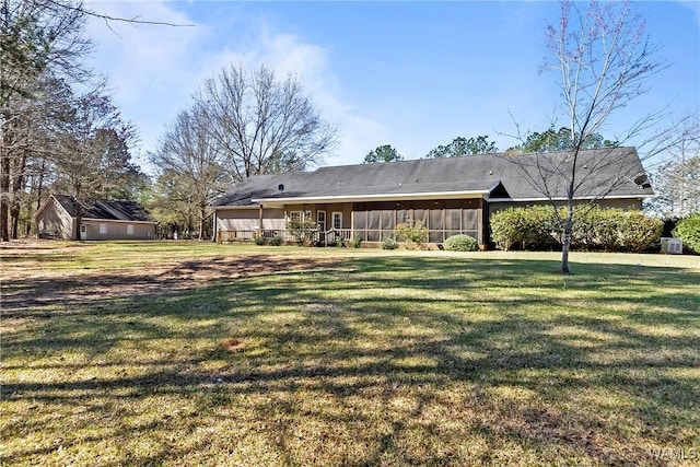 17174 Finnell Rd, Northport, AL 35475 - back of house with a yard and a sunroom