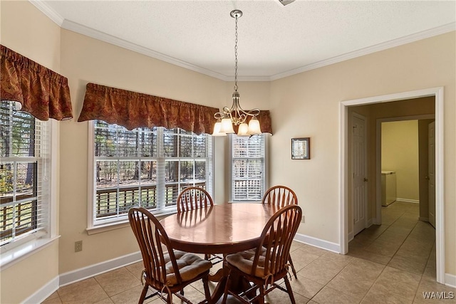 17174 Finnell Rd, Northport, AL 35475 - dining space with an inviting chandelier, crown molding, baseboards, and a textured ceiling