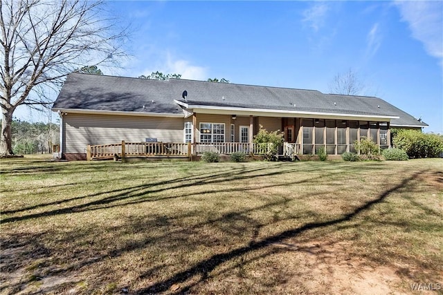 17174 Finnell Rd, Northport, AL 35475 - rear view of property featuring a lawn and a sunroom