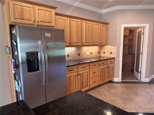 10617 Austin Loop, Vance, AL 35490 - kitchen featuring stainless steel fridge with ice dispenser, crown molding, backsplash, dark stone countertops, and tile patterned floors