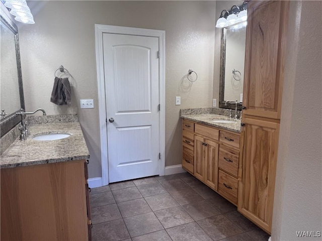 10617 Austin Loop, Vance, AL 35490 - bathroom featuring two vanities and tile patterned flooring