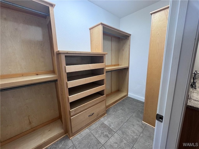 10617 Austin Loop, Vance, AL 35490 - walk in closet featuring tile patterned floors