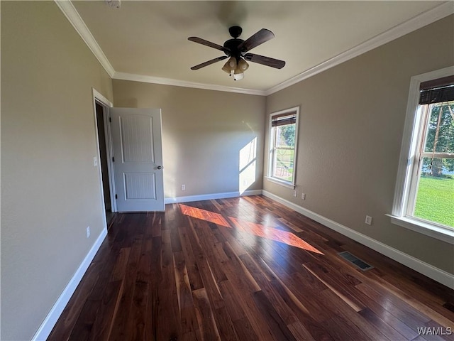10617 Austin Loop, Vance, AL 35490 - unfurnished room with healthy amount of natural light, dark wood-type flooring, ceiling fan, and ornamental molding