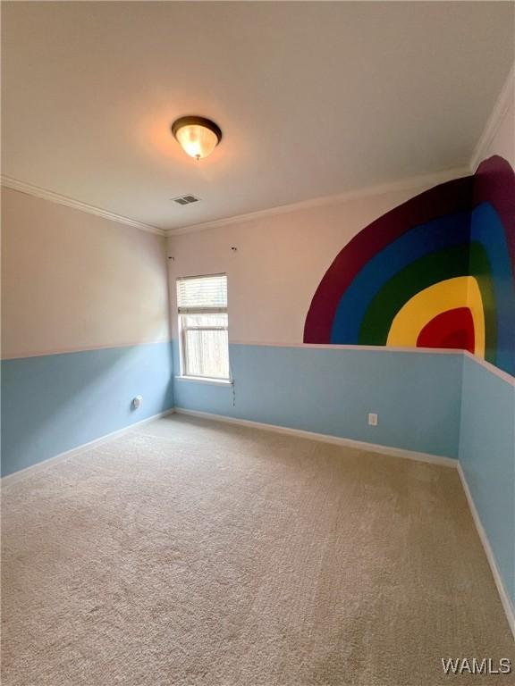 11507 Belle Meade Ave, Northport, AL 35475 - carpeted spare room featuring crown molding and baseboards