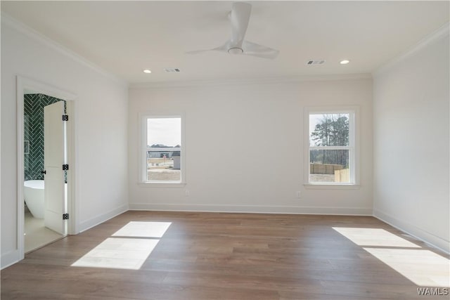 unfurnished room featuring crown molding, ceiling fan, and hardwood / wood-style flooring