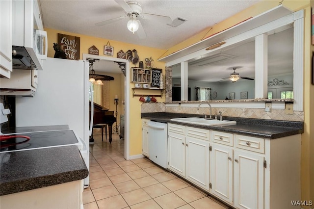 12569 Covered Bridge Rd, Brookwood, AL 35444 - kitchen with ceiling fan, white dishwasher, tasteful backsplash, and light tile patterned floors