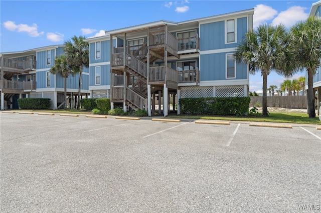 1500 W Beach Blvd Unit 212, Gulf Shores, AL 36542 - view of property featuring uncovered parking
