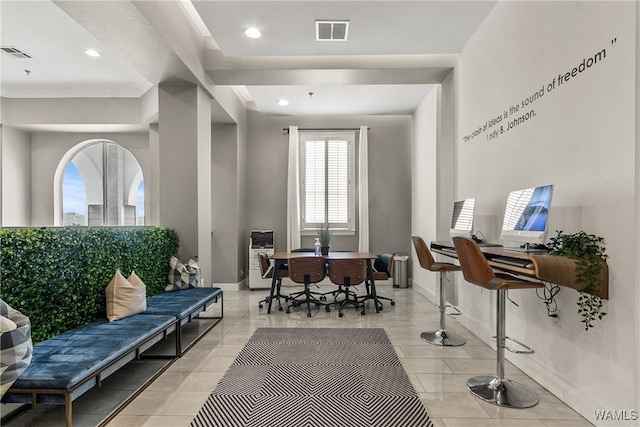 interior space featuring light tile patterned floors, recessed lighting, and visible vents