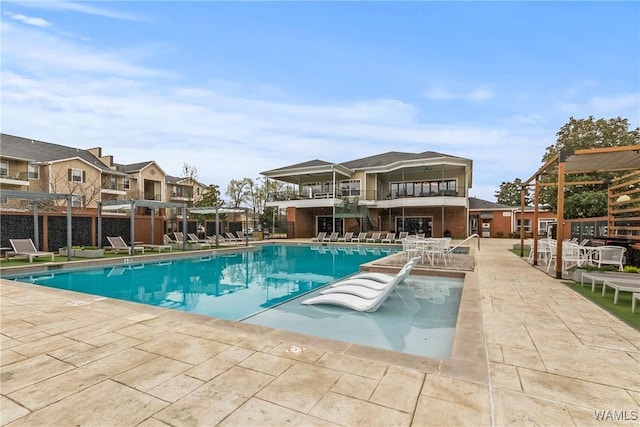 pool with a patio