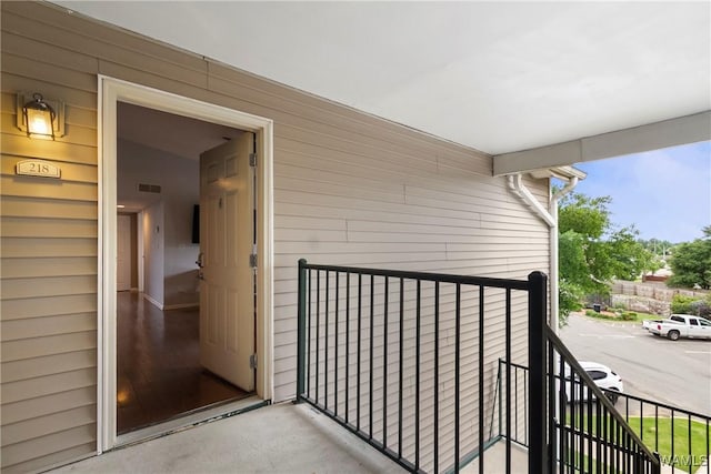 doorway to property featuring a balcony