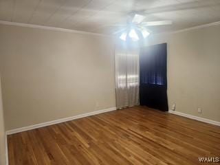 2417 Dvorak Cir, Linden, AL 36748 - unfurnished room with crown molding, wood finished floors, and ceiling fan