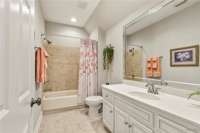 bathroom featuring visible vents, shower / tub combo with curtain, vanity, and toilet