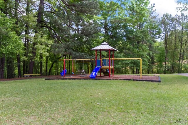 4713 Northwood Lake Dr E, Northport, AL 35473 - communal playground featuring a lawn