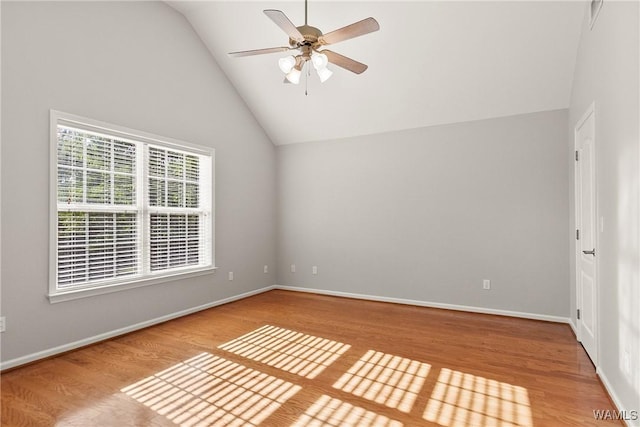 4713 Northwood Lake Dr E, Northport, AL 35473 - spare room with wood finished floors, ceiling fan, lofted ceiling, and baseboards