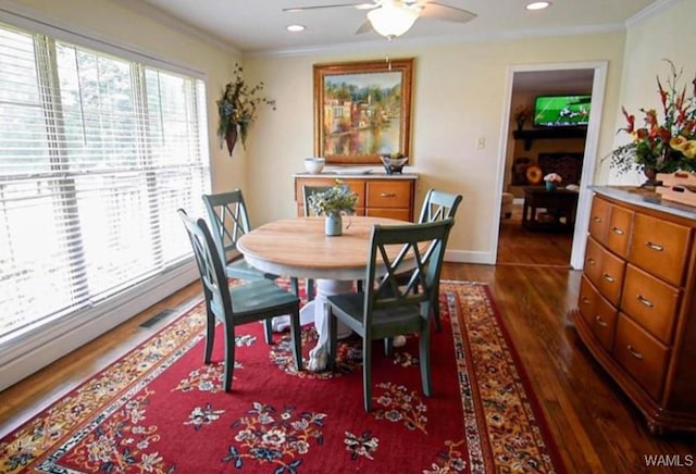 16584 Kathryn Lane Dr, Northport, AL 35475 - dining area with a ceiling fan, dark wood-style floors, crown molding, recessed lighting, and baseboards