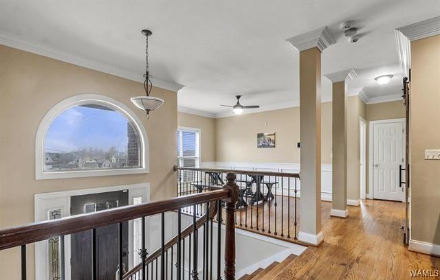 10821 Dogwood Cir, Vance, AL 35490 - back of property featuring brick siding, a sunroom, a shingled roof, a wooden deck, and a fenced backyard