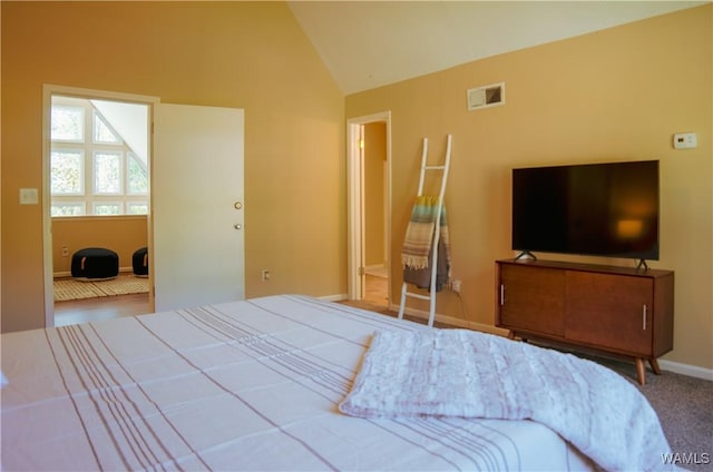 carpeted bedroom with lofted ceiling, baseboards, and visible vents