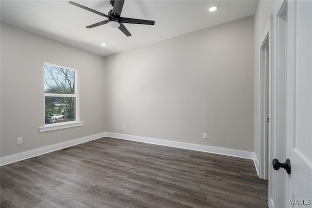 interior space with dark hardwood / wood-style flooring and ceiling fan