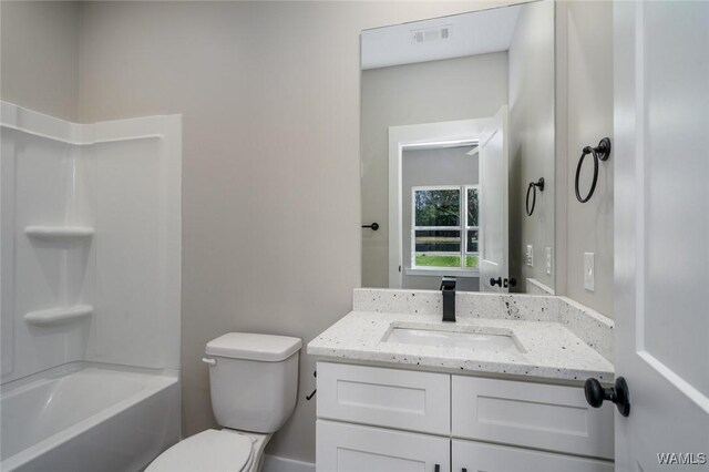 full bathroom with vanity, shower / bathtub combination, and toilet