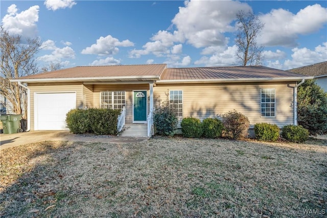 single story home featuring a garage