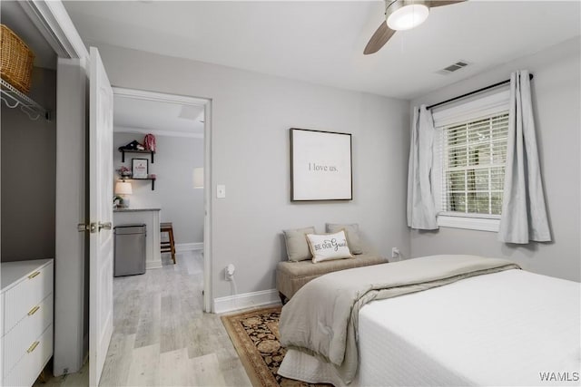 1402 9th St Unit 23, Tuscaloosa, AL 35401 - bedroom with light wood finished floors, a ceiling fan, and baseboards