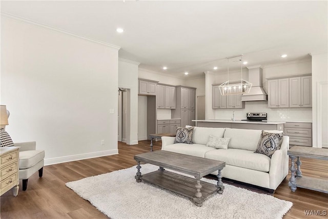 living room with crown molding and dark wood-type flooring