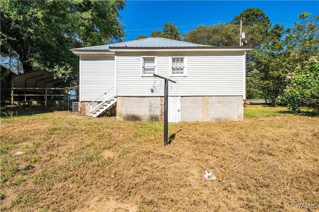 exterior space with a carport