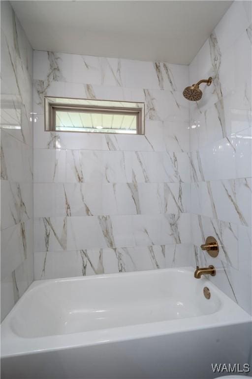 full bath featuring shower / bath combination