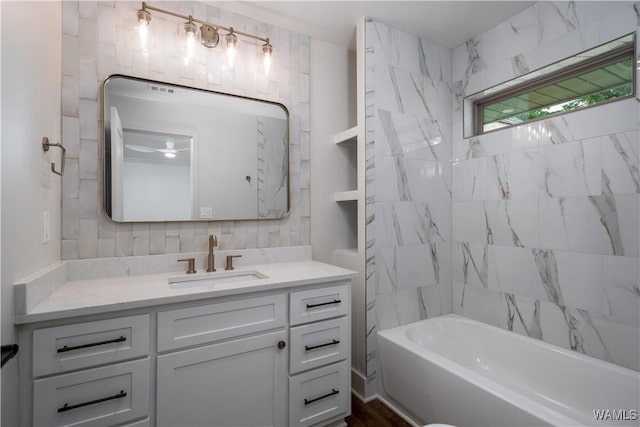 full bath featuring vanity and shower / bathtub combination