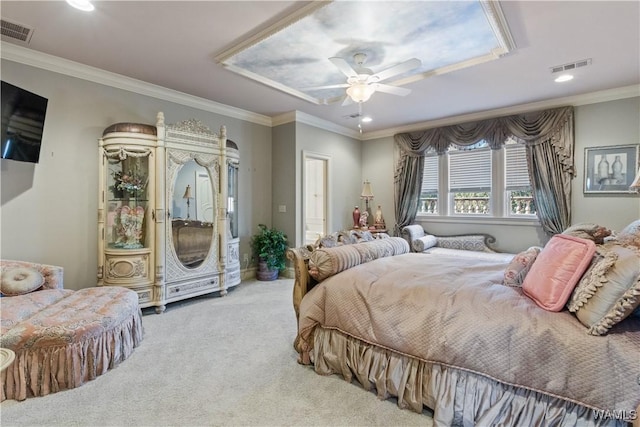 carpeted bedroom with ceiling fan and ornamental molding