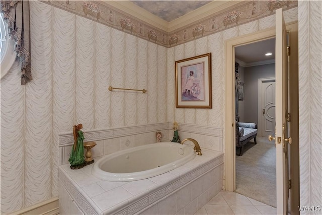 bathroom featuring tile patterned flooring, a relaxing tiled tub, and ornamental molding