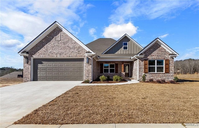 view of front of house with a garage and a front yard