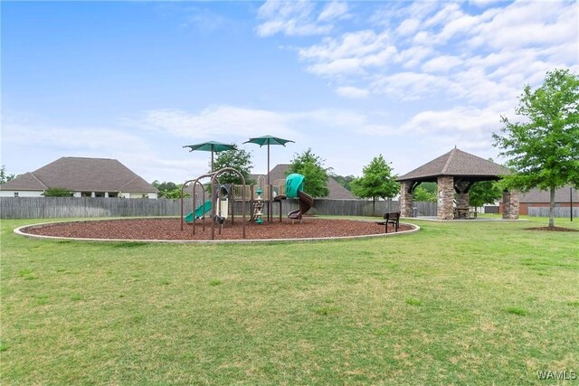 view of jungle gym featuring a yard and a gazebo