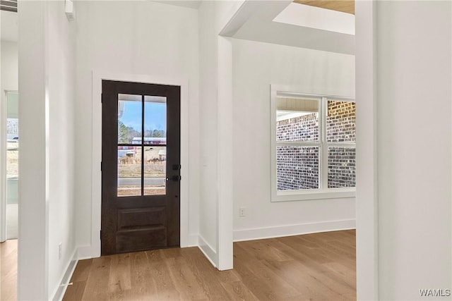 entrance foyer with light hardwood / wood-style floors