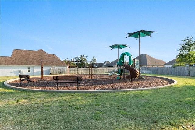 view of playground featuring a lawn