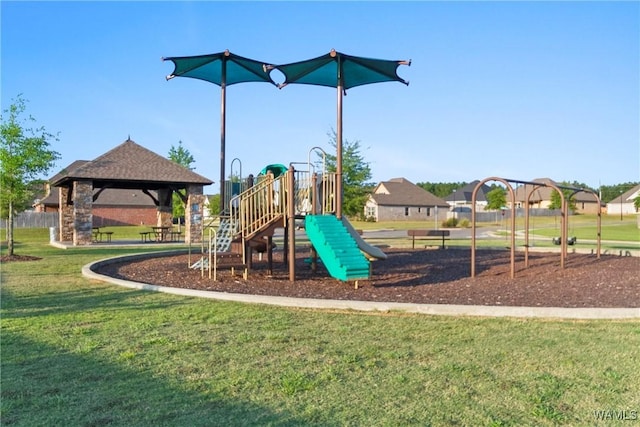 view of playground with a gazebo and a yard