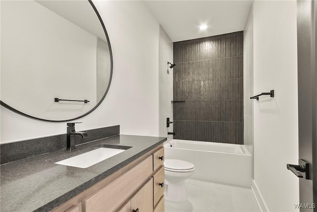 full bathroom featuring tile patterned flooring, shower / washtub combination, vanity, and toilet