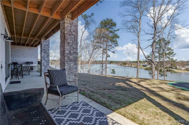 view of yard with a water view