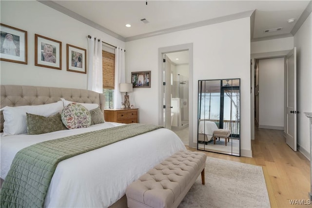 bedroom with connected bathroom, recessed lighting, visible vents, and light wood-type flooring