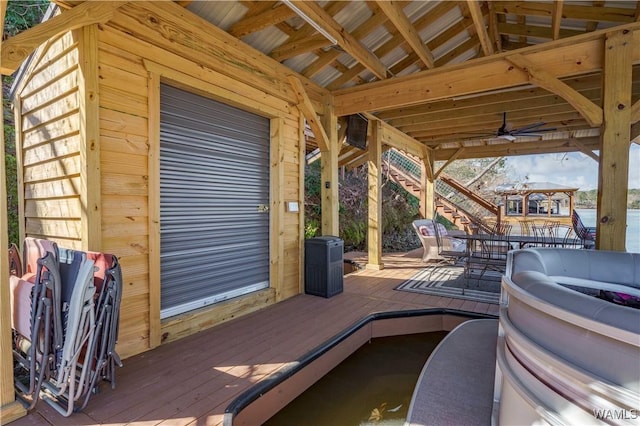 wooden deck featuring outdoor dining space
