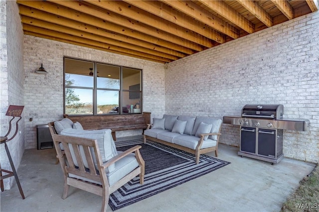 view of patio / terrace with grilling area and an outdoor hangout area