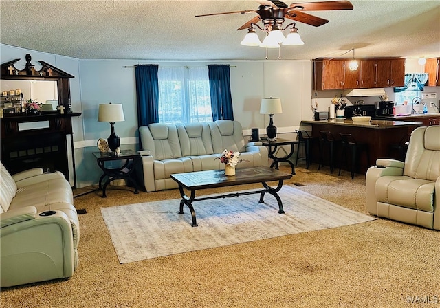 11624 Summer Chase Rd, Mccalla, AL 35111 - living area featuring a textured ceiling, ceiling fan, and light carpet