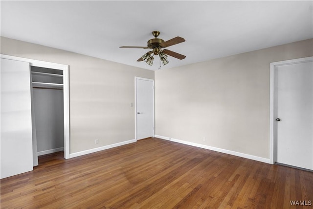 unfurnished bedroom with hardwood / wood-style flooring and ceiling fan