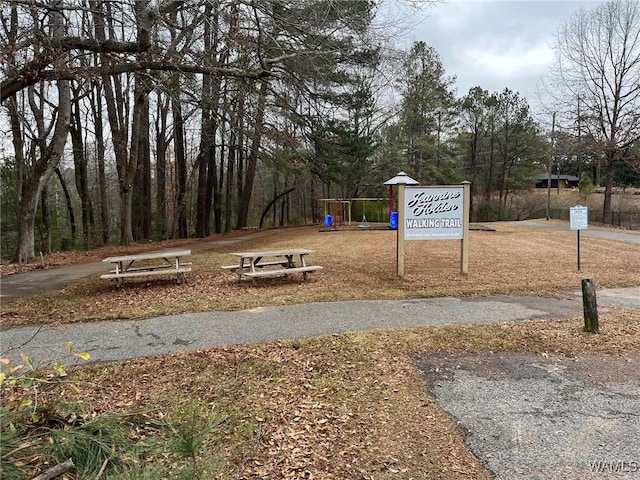 view of home's community featuring a playground