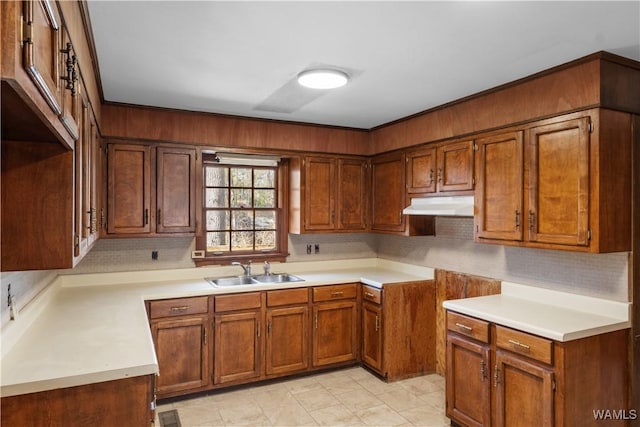 kitchen with sink and backsplash