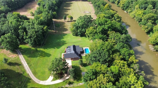 birds eye view of property featuring a rural view and a water view