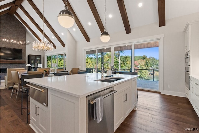 12437 Rising Tide, Northport, AL 35475 - kitchen featuring white cabinets, a kitchen island with sink, dark wood-type flooring, sink, and dishwasher
